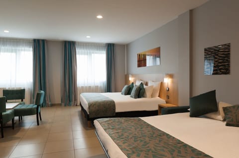 Double or Twin Room, Accessible | Minibar, desk, blackout drapes, soundproofing