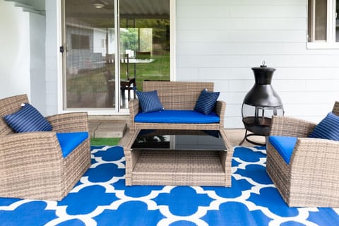 Outdoor conversation set with wood burning firepit