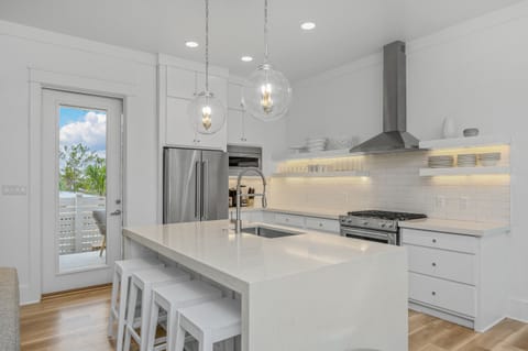 Gourmet stocked kitchen for cooking and dining
