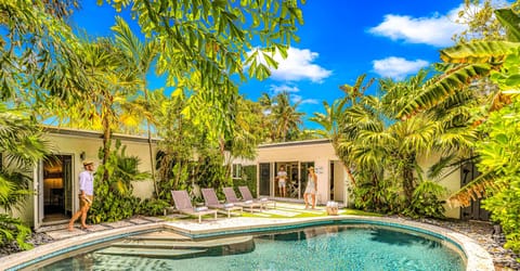 This modern residence is snuggled in a cul-de-sac of Birch Park Finger Estates, just off the picturesque A1A and steps away from the beach.