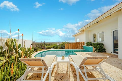 Cool off in your private pool surrounded by peaceful nature and constant Aruban breeze, your own secluded oasis