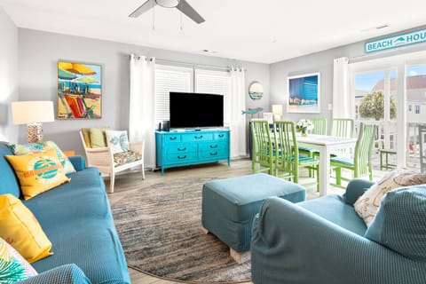 Open living and dining area at Sea Lakes 103C, a 2-bedroom Cherry Grove vacation rental from Thomas Beach Vacations