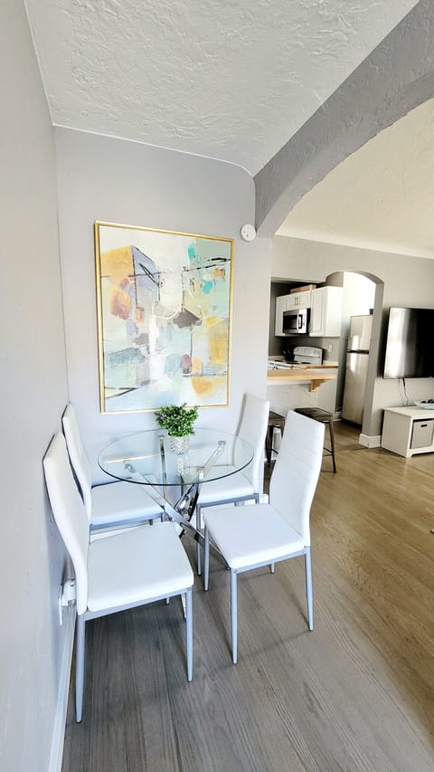 Bar top seats 4, upstairs dining set seats 4, downstairs set seats 4.