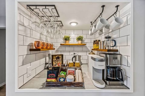 Custom coffee and wine bar. Custom designed and built, this coffee and wine bar is your liquid heaven. Start your day with a cup your way, take one to-go, or enjoy a night cap with a glass of local Door County wine.