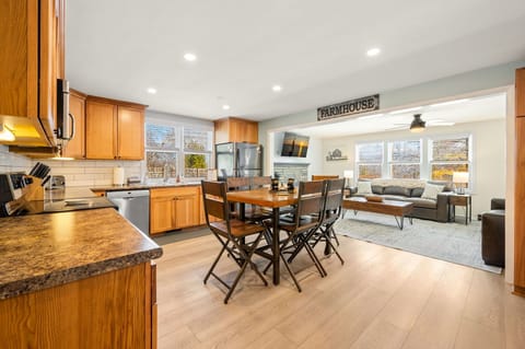 Northwoods Farmstead open concept kitchen and living room is the perfect gathering space for groups.