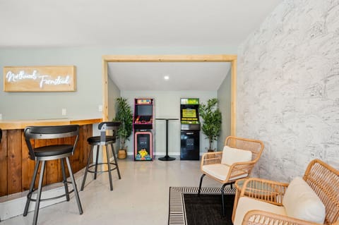 Ms. Pacman and Golden Tee arcade games await you for a fun night at home.