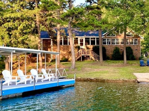 Enjoy a swim from the dock, paddling kayak from the ramp, or watching festivities from shaded porch.