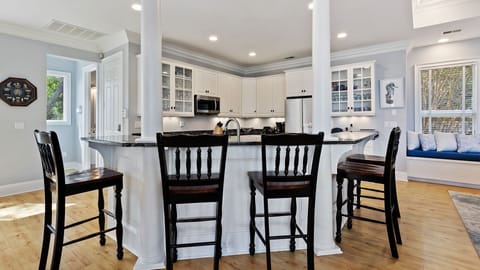 Raise a glass while watching the cook