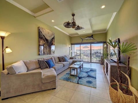 Spacious open family room leading to balcony with canal view