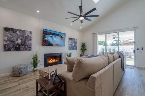 Family Room: 75" Smart TV +Natural Gas Fireplace