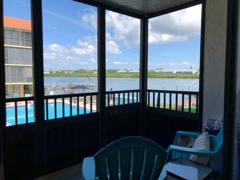 View of the intercoastal water of Indian Shores and the waterfro - View of the intercoastal water of Indian Shores and the waterfront pool from the screened in balcony!