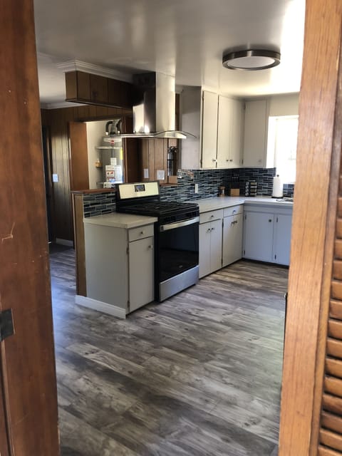 Kitchen looking towards laundry.