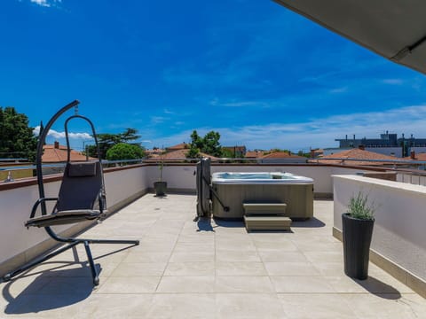 Sky, Cloud, Plant, Property, Azure, Shade, Urban Design, Outdoor Furniture, Flowerpot, Leisure