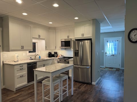 Kitchen, looking toward front entry.