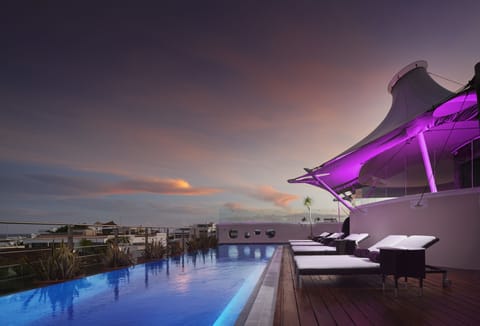 Outdoor pool, open 8 AM to 10 PM, pool umbrellas, sun loungers