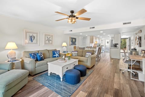 Open floor plan with functional flow of the living room, dining area & kitchen 