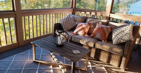 Screened in porch for you to cozy up and relax