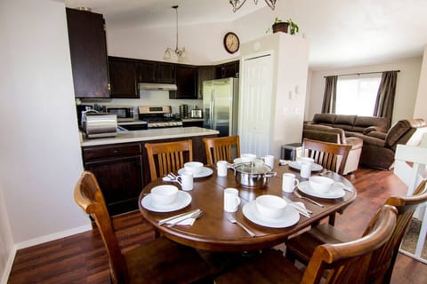 Fully equipped kitchen and dining area on the middle level