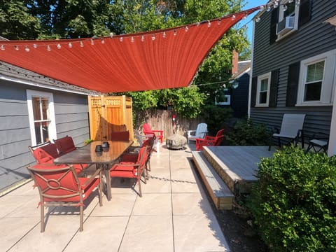 Seating for 6 plus more! With cedar outdoor shower and a firepit w/ Adirondacks!