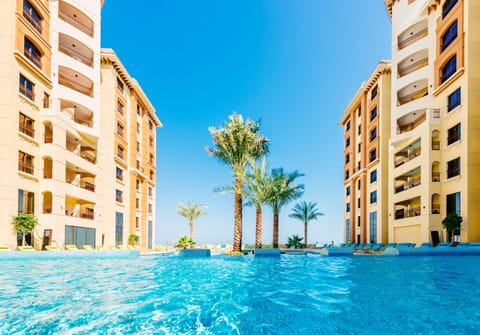 2 indoor pools, outdoor pool, open 8:00 AM to 6:00 PM, pool umbrellas