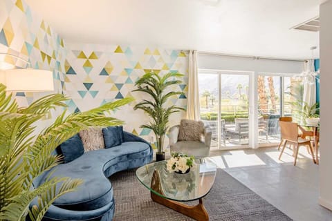 Basking in sunshine, this light, airy end condo has views forever!
