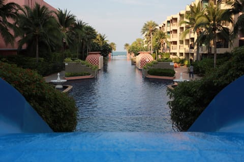 2 outdoor pools, open 7:00 AM to 8:00 PM, pool umbrellas, sun loungers