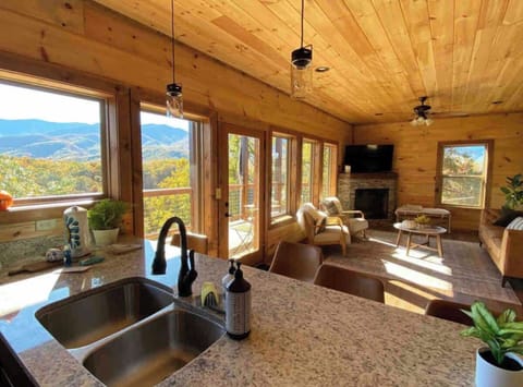 Kitchen opens up to sitting area