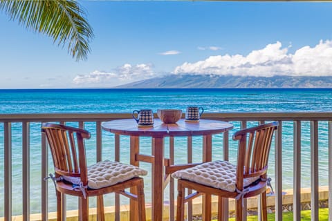 Just 10 feet from the water and amaing sunset views - Oceanfront lanai just 10 ft from the water—your front-row seat to paradise