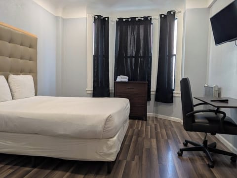 Deluxe Room (with Shared Bathroom) | Premium bedding, down comforters, desk, free WiFi