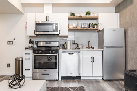 Our Kitchen is stocked w/ Utensils, Plates and everything you need for a dinner