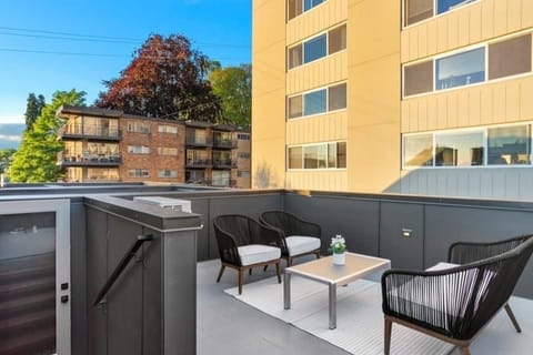 Our rooftop patio with views of downtown skyline and Space Needle