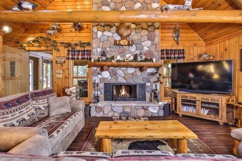 cozy sitting on either side of double sided wood burning fireplace