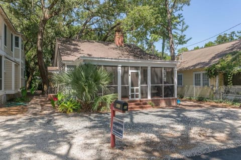 Front exterior of property with screend porch