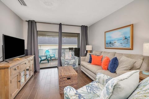 Shipwatch 305 - Living room area with access to balcony