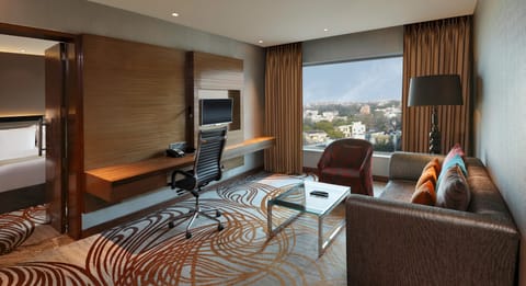 Suite, 1 King Bed, Smoking | Minibar, in-room safe, individually decorated, individually furnished