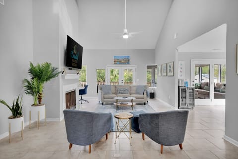 Spacious living room with flatscreen tv.