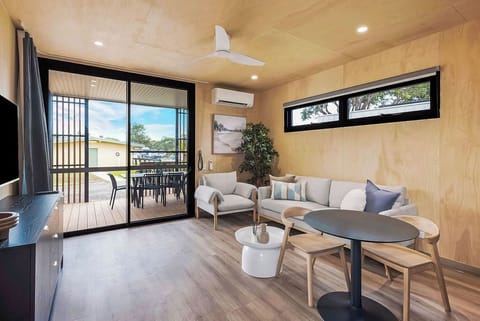 Superior Cabin | Living area | Flat-screen TV