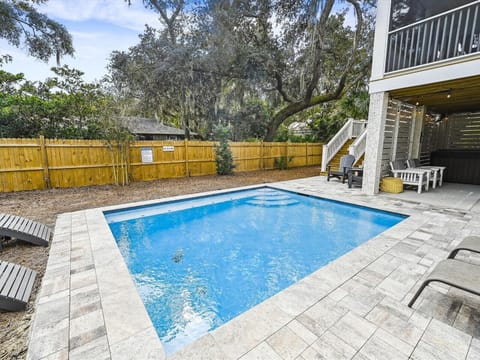 Fenced Pool Area and Backyard at 32 Firethorn