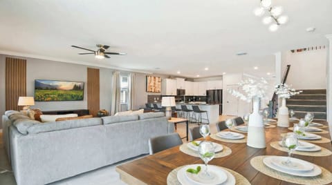 The dining area offers ample space to comfortably accommodate everyone, ensuring a pleasant and sociable dining experience for all