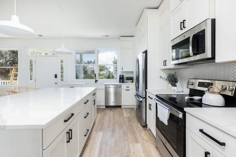 Spacious Chef’s Kitchen with Ample Countertops – Designed for convenience and style.