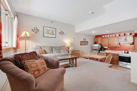 View of living, dining, and kitchen area