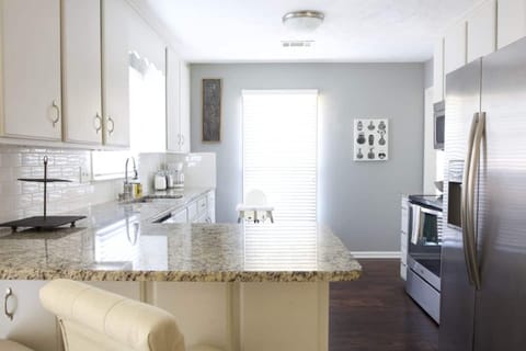 Enter into a fully stocked kitchen with all brand new appliances.