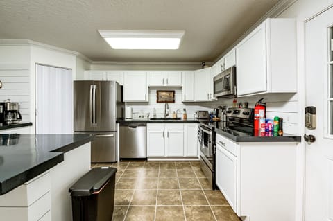 Full kitchen with new stainless steel appliances