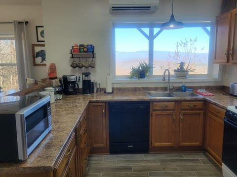 Dishwasher, gas stove and full size refrigerator.