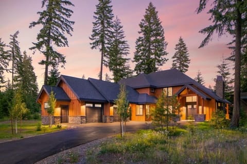 Luxury lodge-style retreat with soaring rooflines and serene mountain serenity