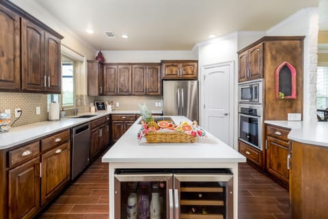 Whip up your family secret recipes here in this gourmet kitchen.