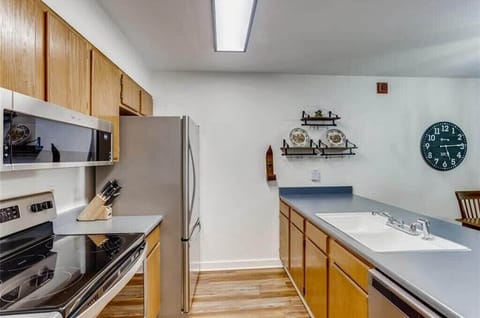 Fully-equipped kitchen with modern stainless steel appliances