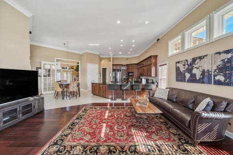 Open sightlines & ample seating in the living areas are ideal for gathering.