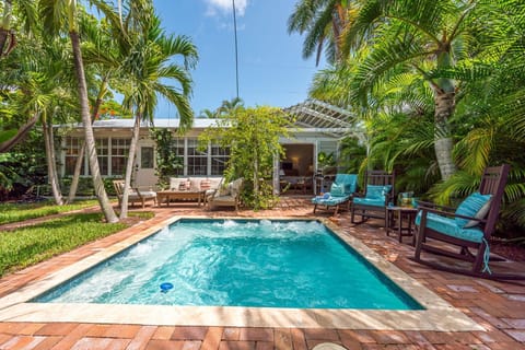 Dip into the luxury heated pool anytime!