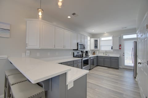 The kitchen boasts plenty of space for parties of all sizes.